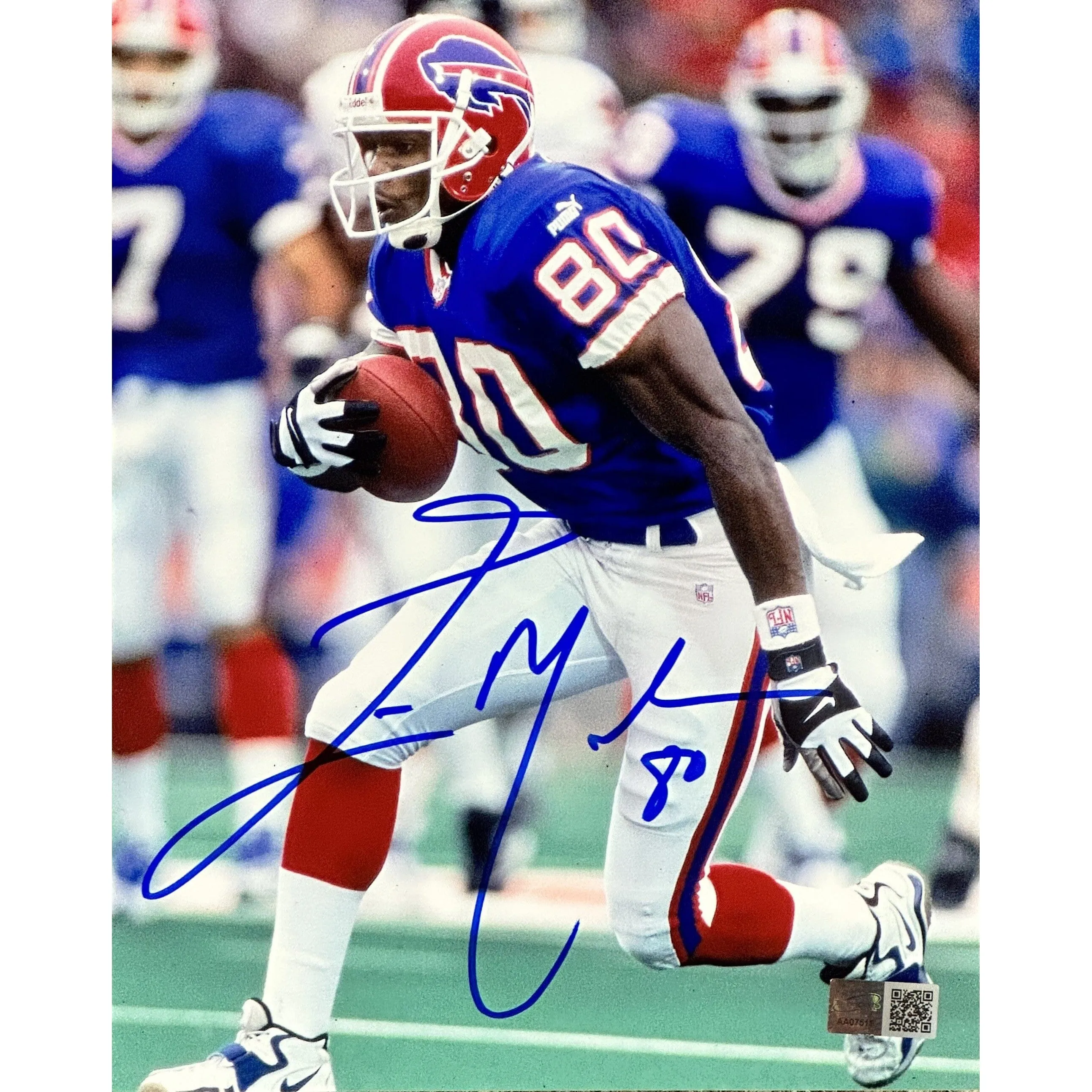 Eric Moulds Signed Running in Blue 8x10 Photo